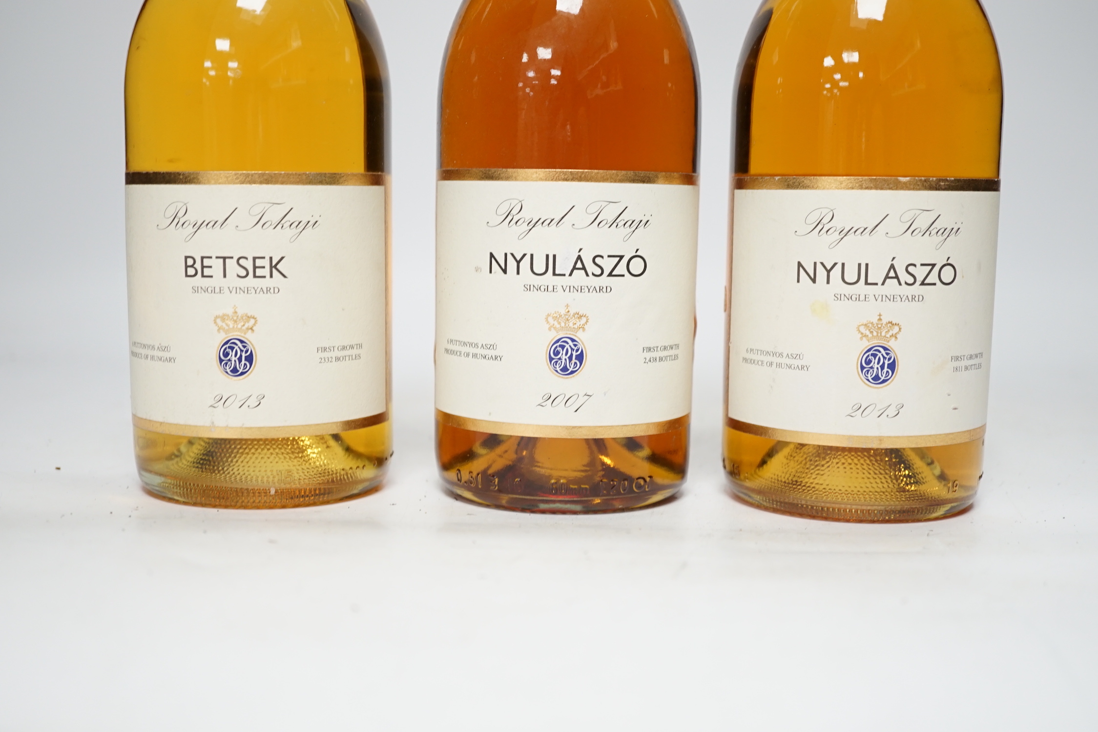 Three bottles of Royal Tokaji singke vineyard 6 puttonyos, each 50cl, Betsek 2013 and Nyulaszo 2007 & 2013.